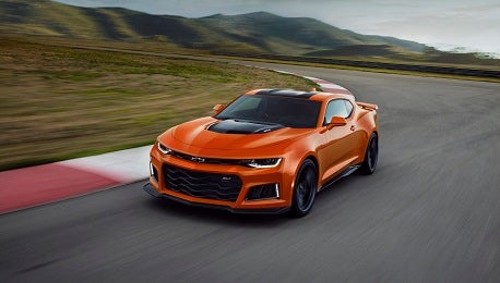 An orange 2023 Chevrolet Camaro.