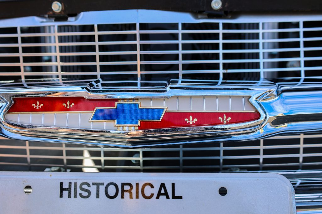 An image of a Historical tag plate on a car at the 16th Annual Coughlin Car Show.